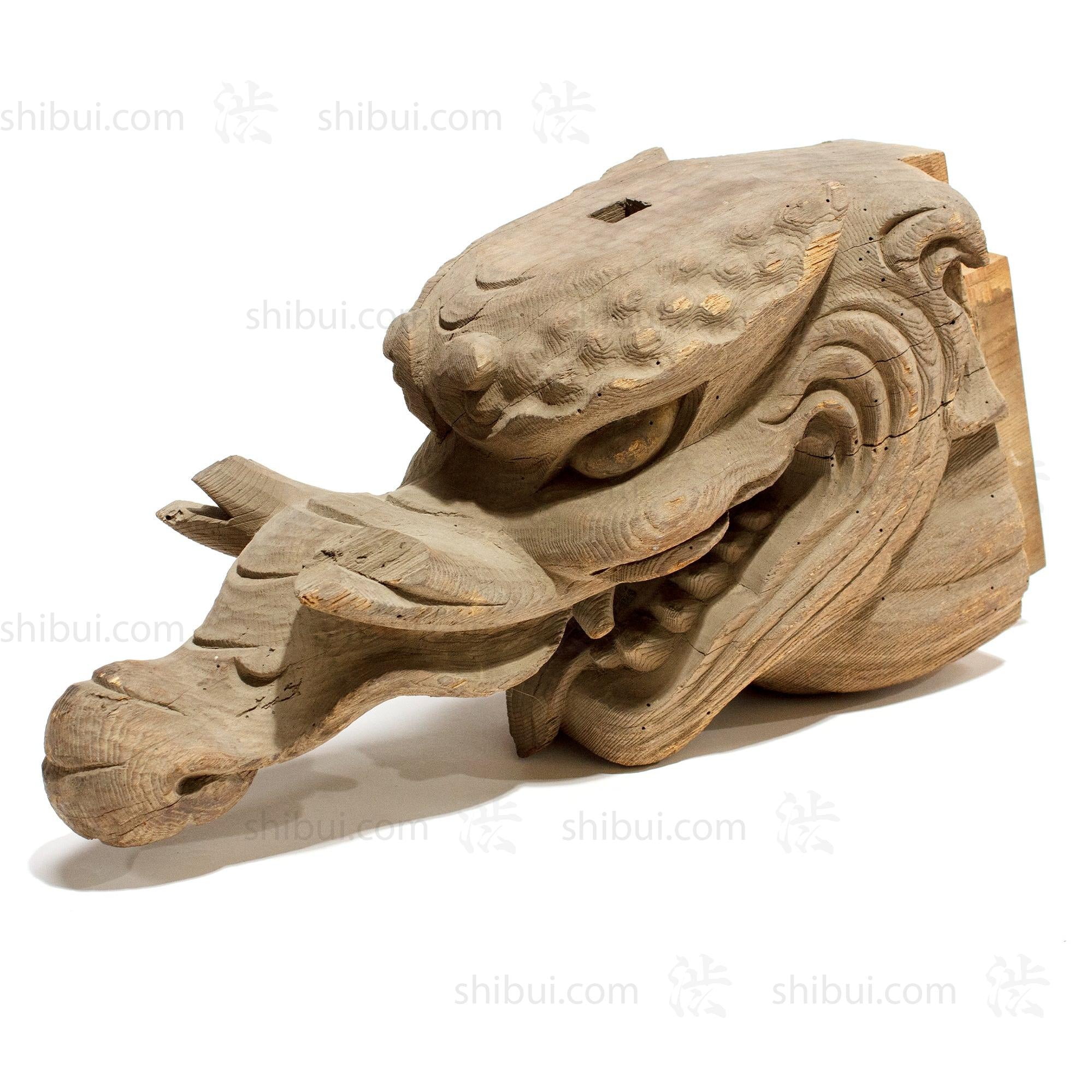 Pair of Hand Carved Baku Carvings