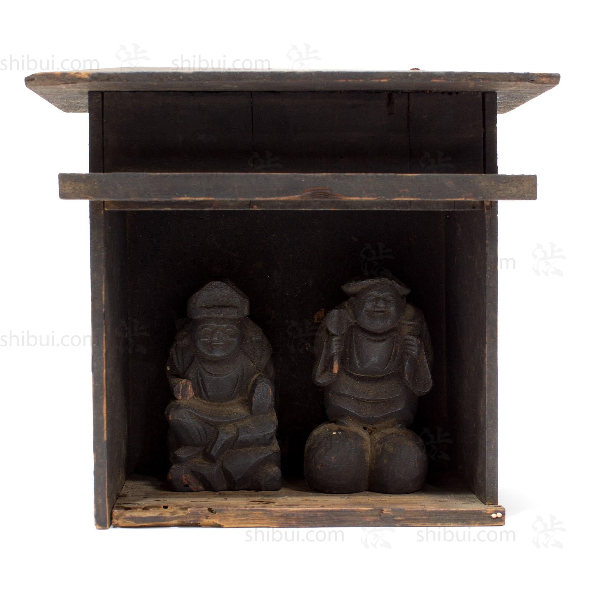 Shrine with Wooden Daikoku and Ebisu.