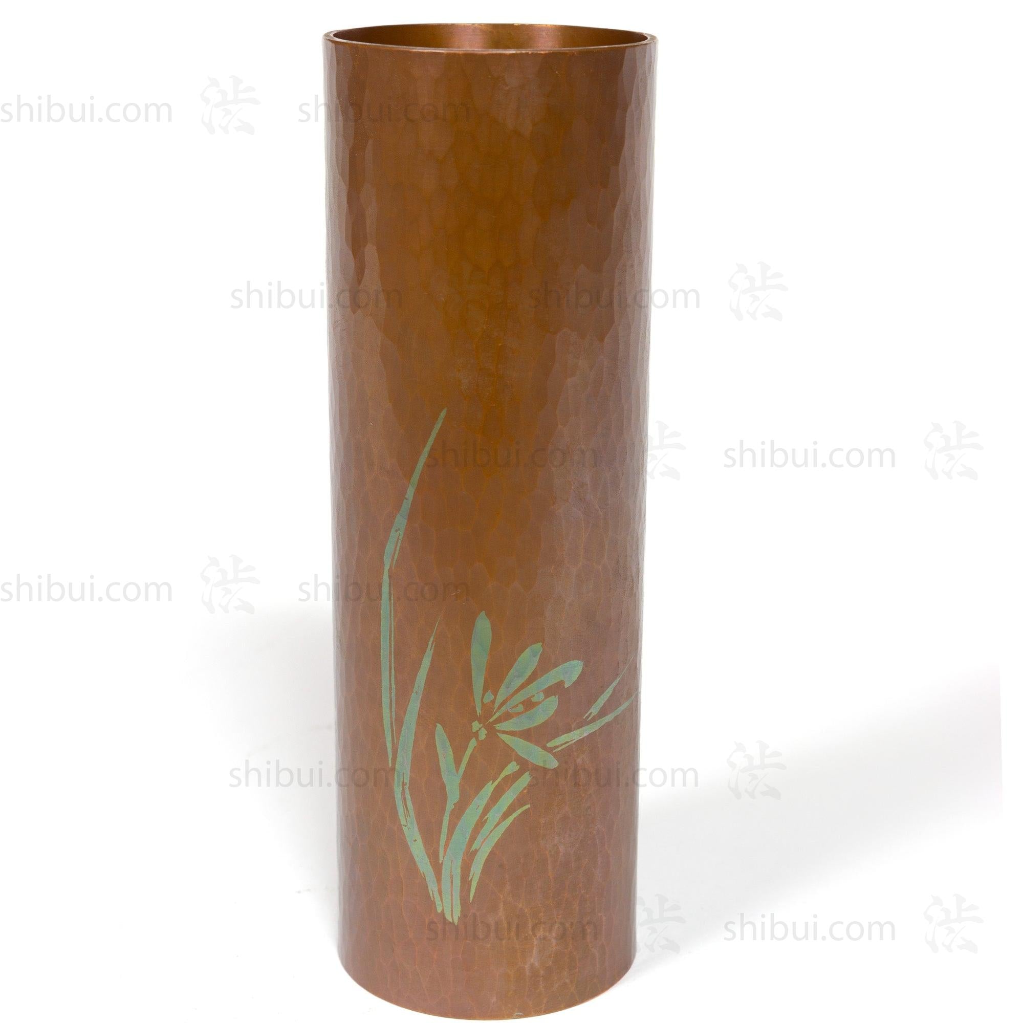 Vintage Hammered Bronze Vase With Flower Image