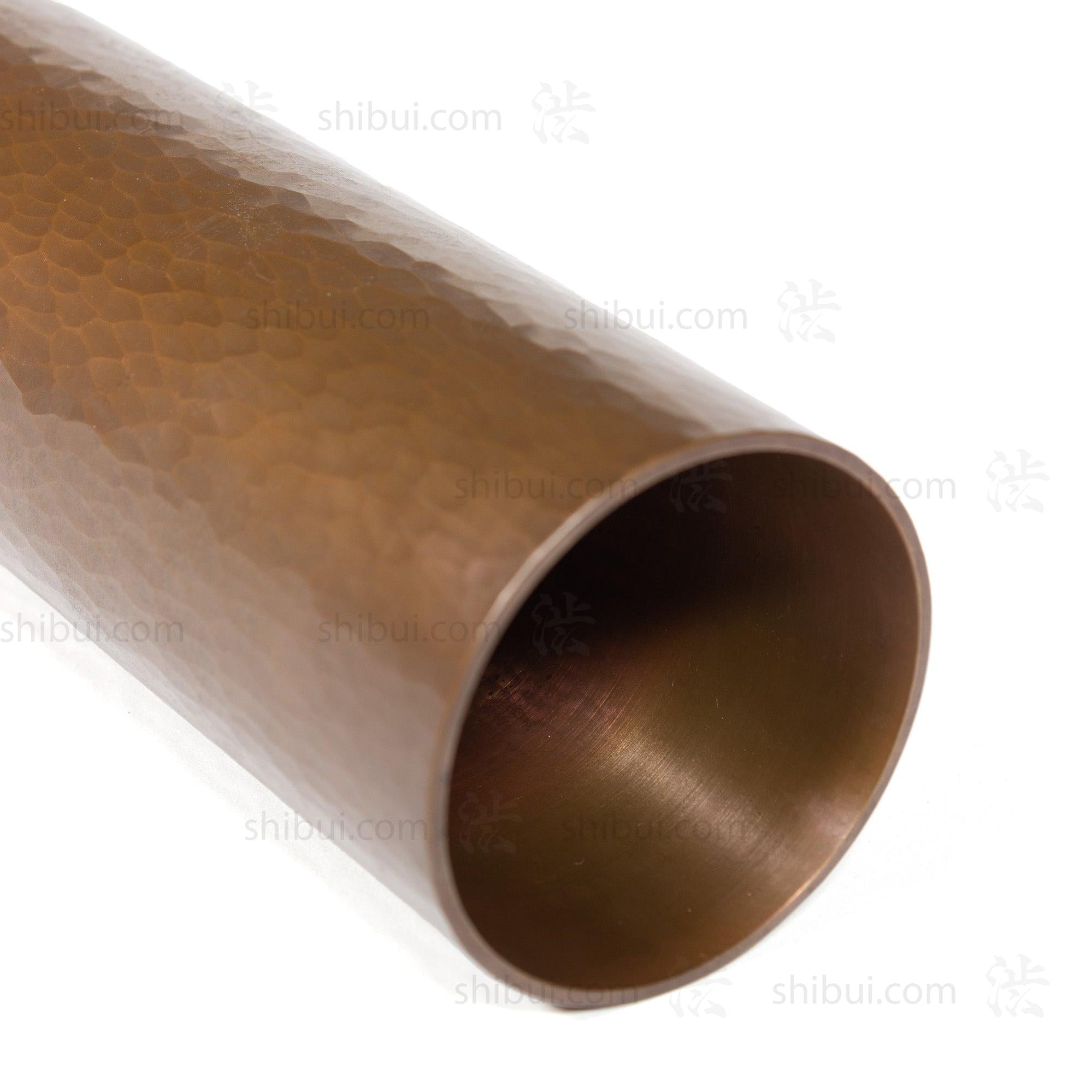 Vintage Hammered Bronze Vase With Flower Image