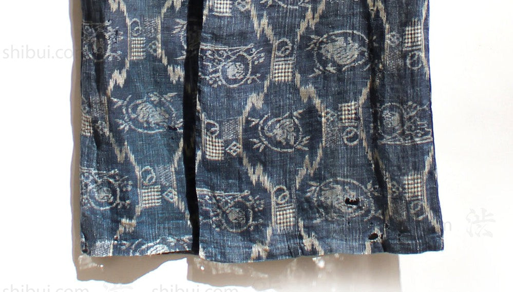 Hemline Detail | Japanese Antique (Late 19th Century) Children's Kasuri Kimono | Child's Robe | Daikoku Motif | Hand-Sewn Indigo Resist Dyed Linen | Japanese Ikat