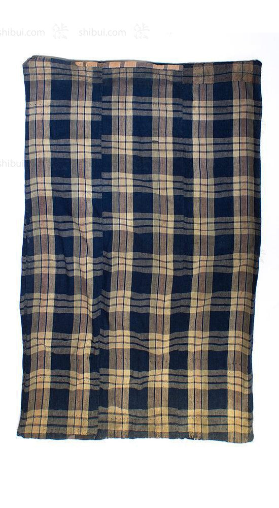 tan and blue futon cover