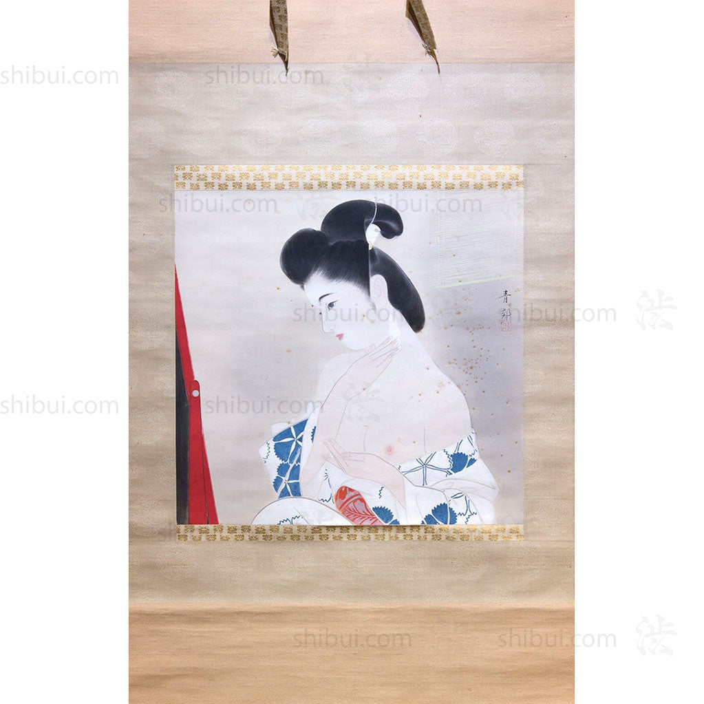 closeup of scroll painting of woman