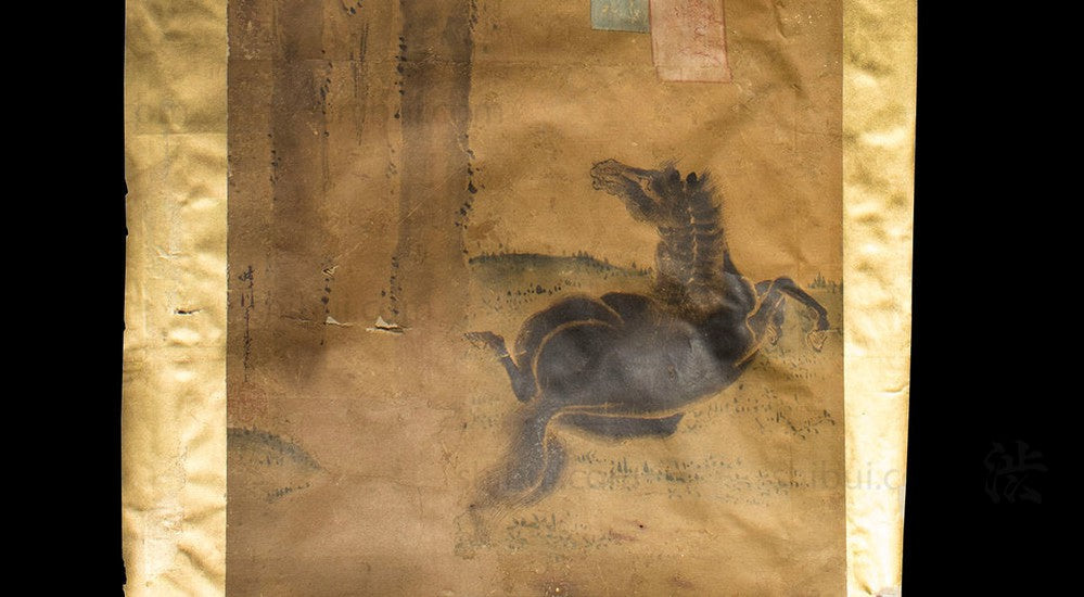 closeup of painting with black horse