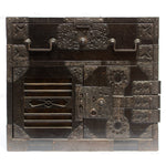 Front side of antique japanese sea chest (a kind of tansu) displaying ornate iron hardware. From the Edo period.