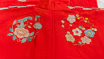 back shoulder line of red kimono with embroidery 