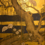 closeup of heron screen with tree and flowers
