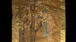 closeup of painting with cherry blossoms and poem cards