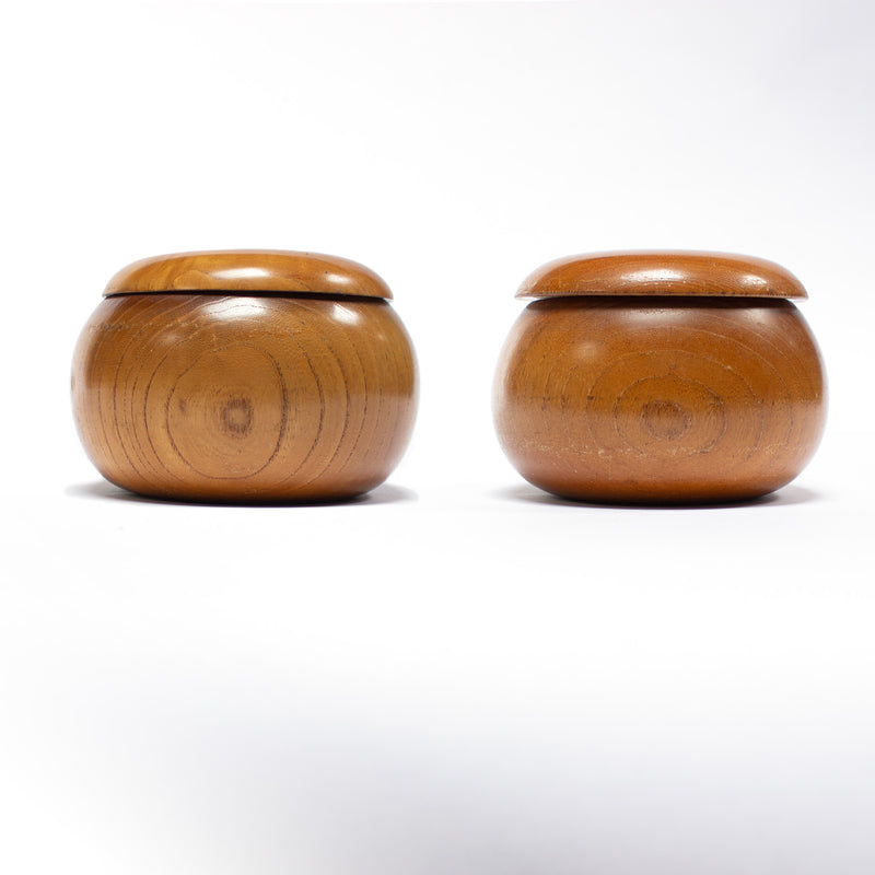 Two go seigen (rounded chinese-style) goke (go stone bowls).