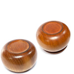 Underside of two  go seigen goke (rounded chinese-style go stone bowl).